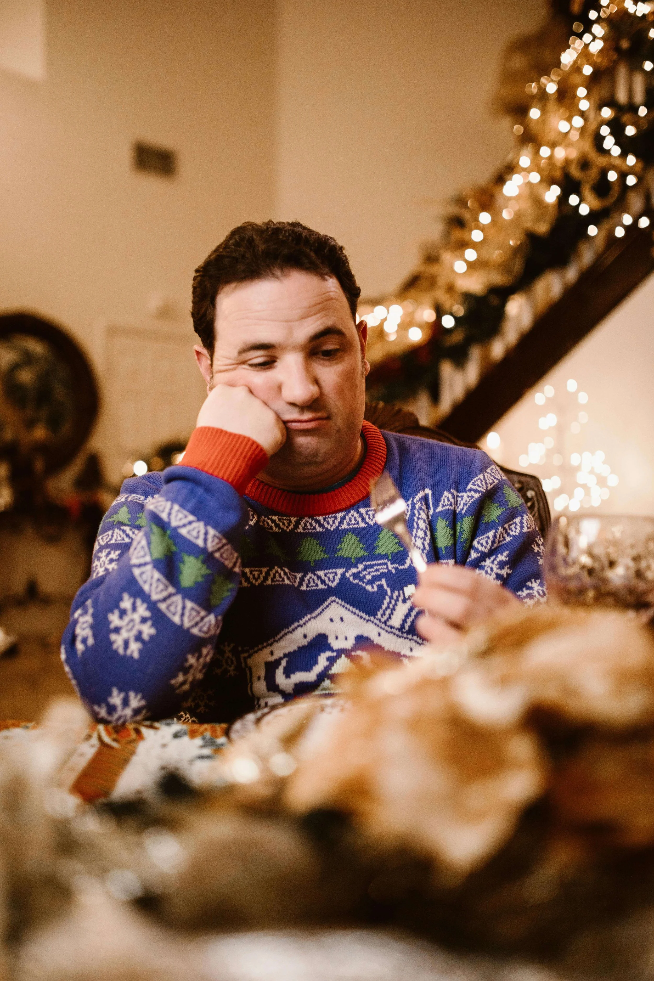 man alone at table | ocd counseling boston ma | ocd therapist boston ma | icbt for ocd boston ma | why is my OCD worse during Christmas | Cambridge, MA | Somerville, MA | Brookline