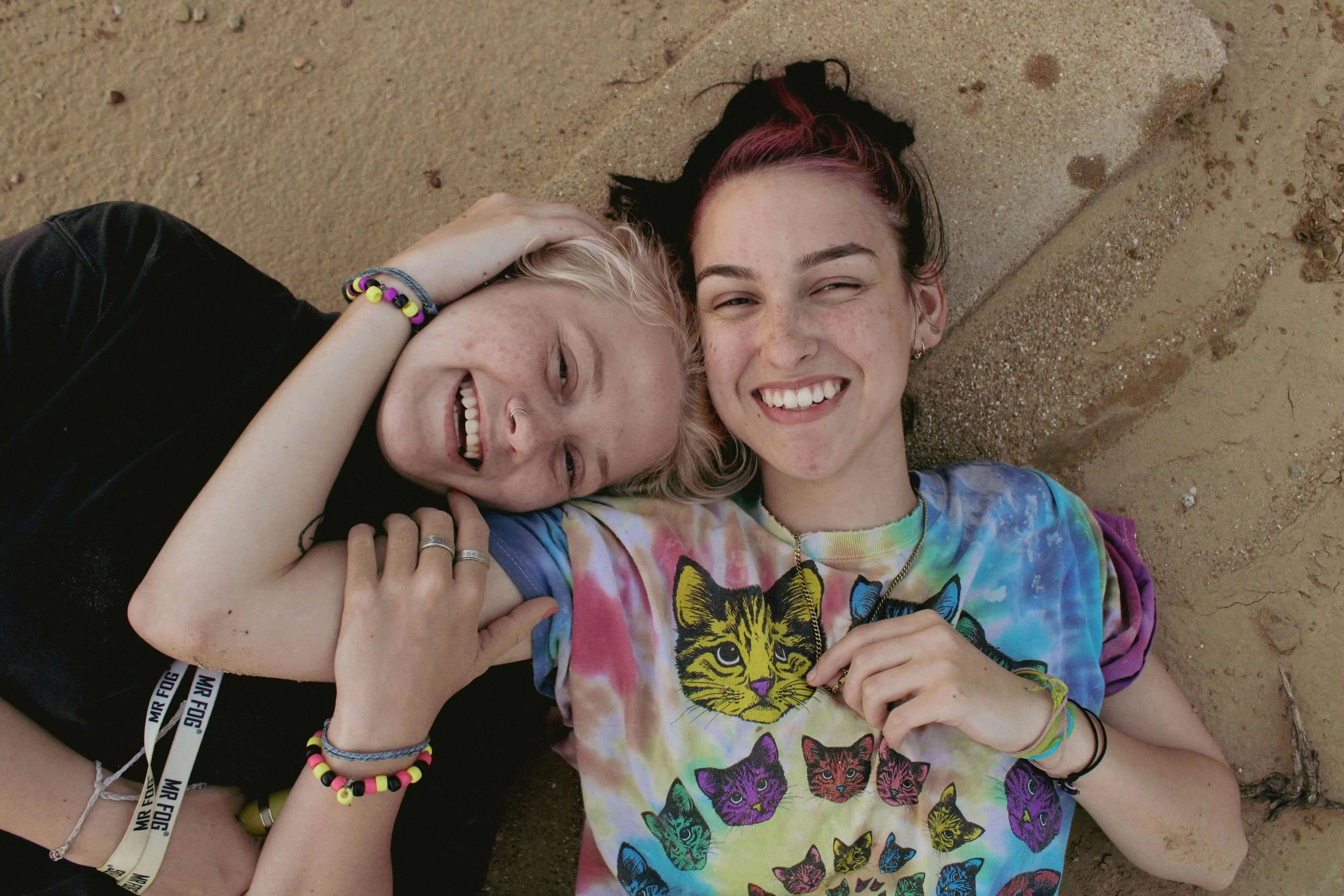 young LGBTQ+ couple in sand | ocd therapy boston ma | ocd counseling boston ma | ocd therapist boston ma | Cambridge, MA | Somerville, MA | boston, MA