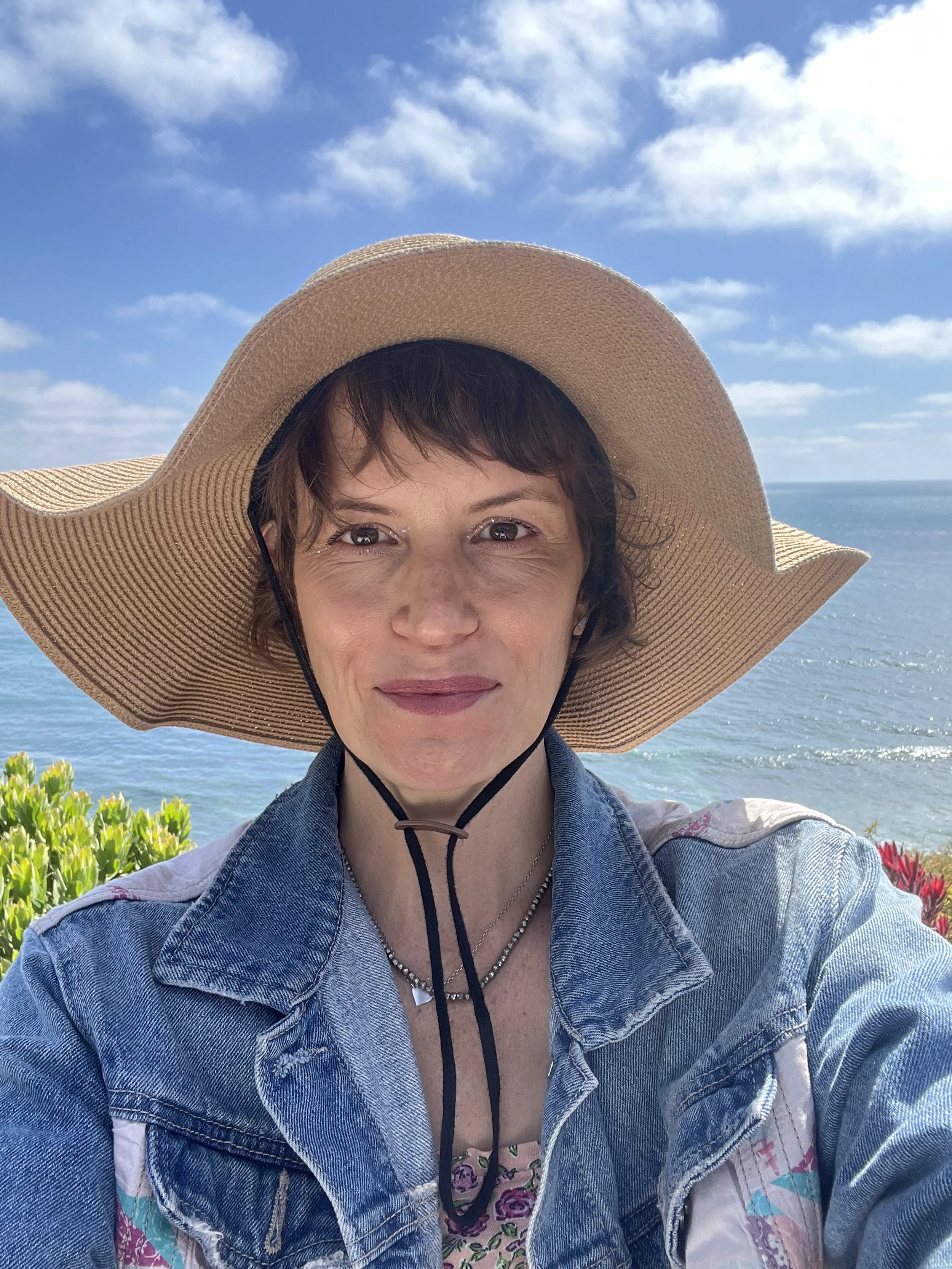 A portrait photo of Jen Lescher, an OCD therapist in Boston, MA. Jen offers mindfulness-based therapy to help you stay grounded with OCD and anxiety.