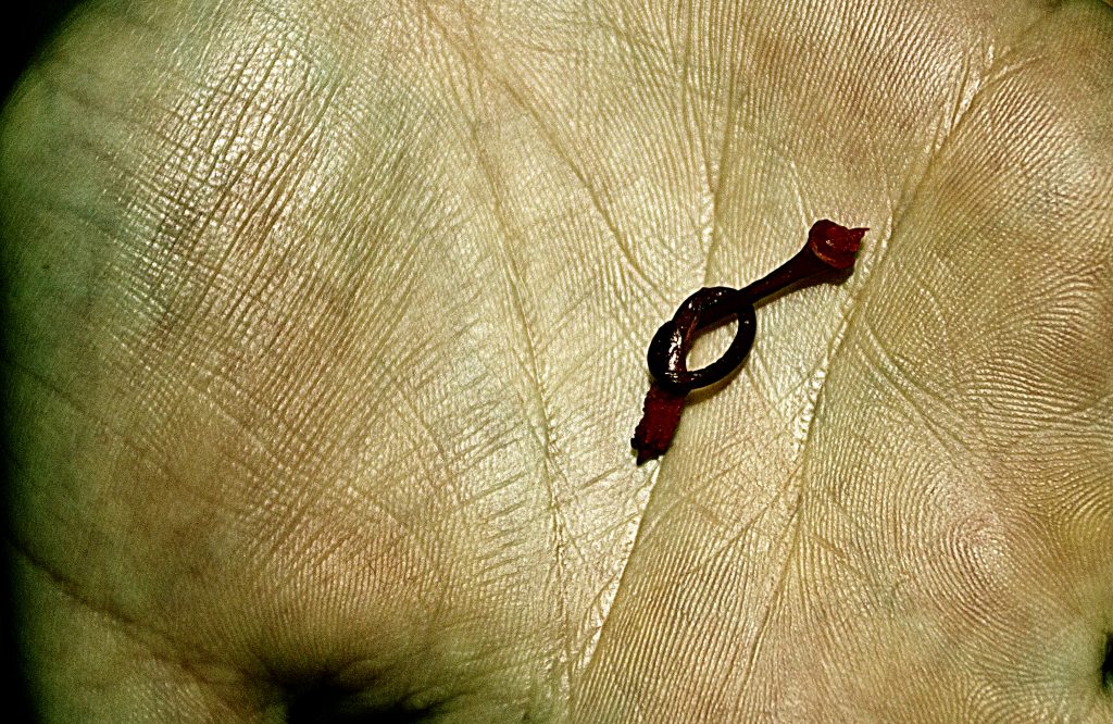 A cherry stem tied in a knot on someone's palm. OCD therapy in Boston, MA can help with relationship anxiety, OCD and more. Get started today!